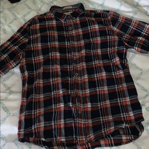 Orange and navy blue flannel by On The Road